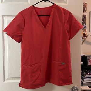 Figs three pocket scrub top in limited edition clay color! Gently used!